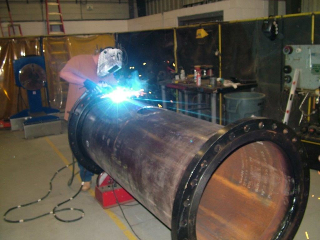 DECCO Worker with Large Pipes